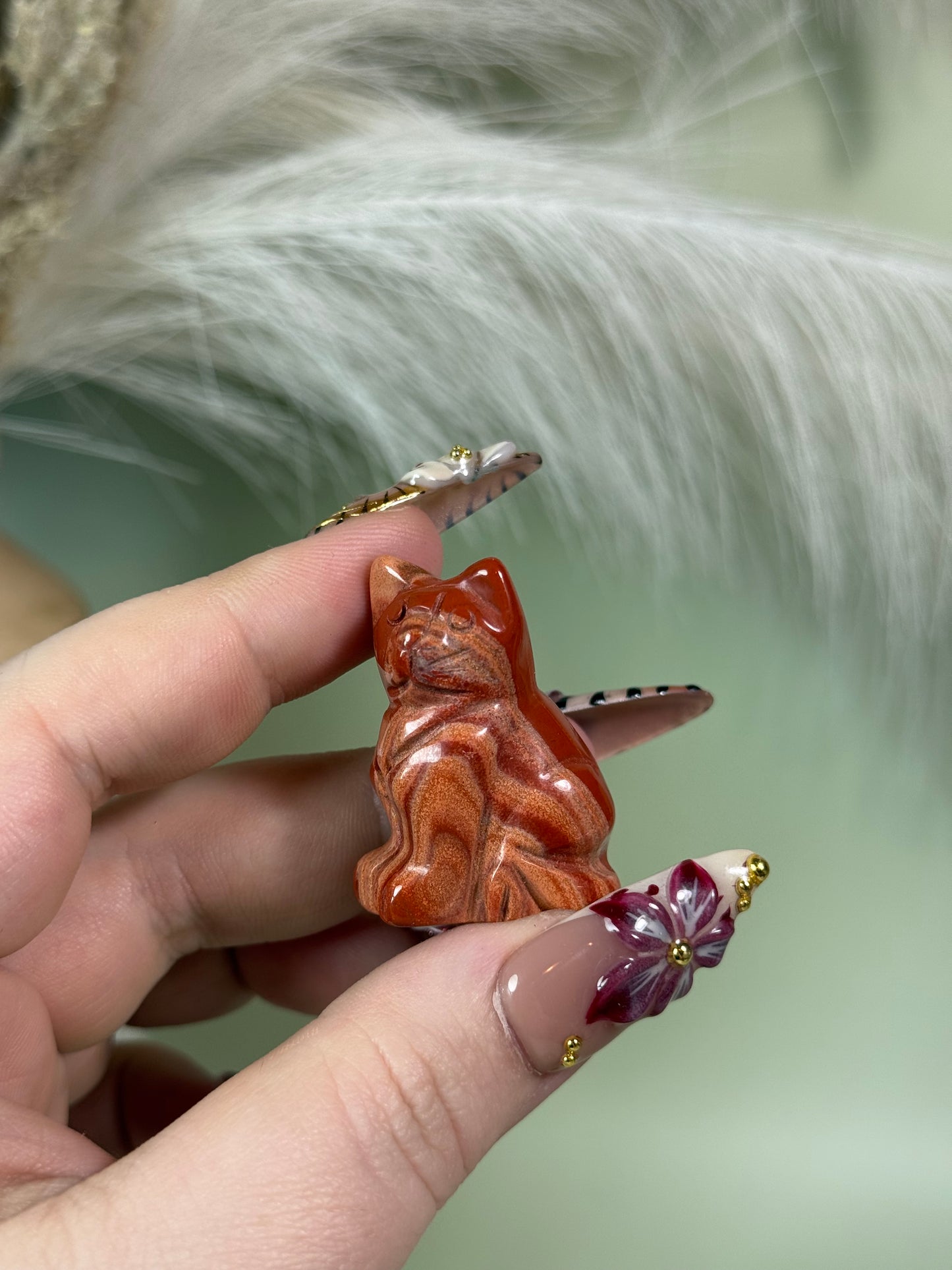 Crystal cat carvings.