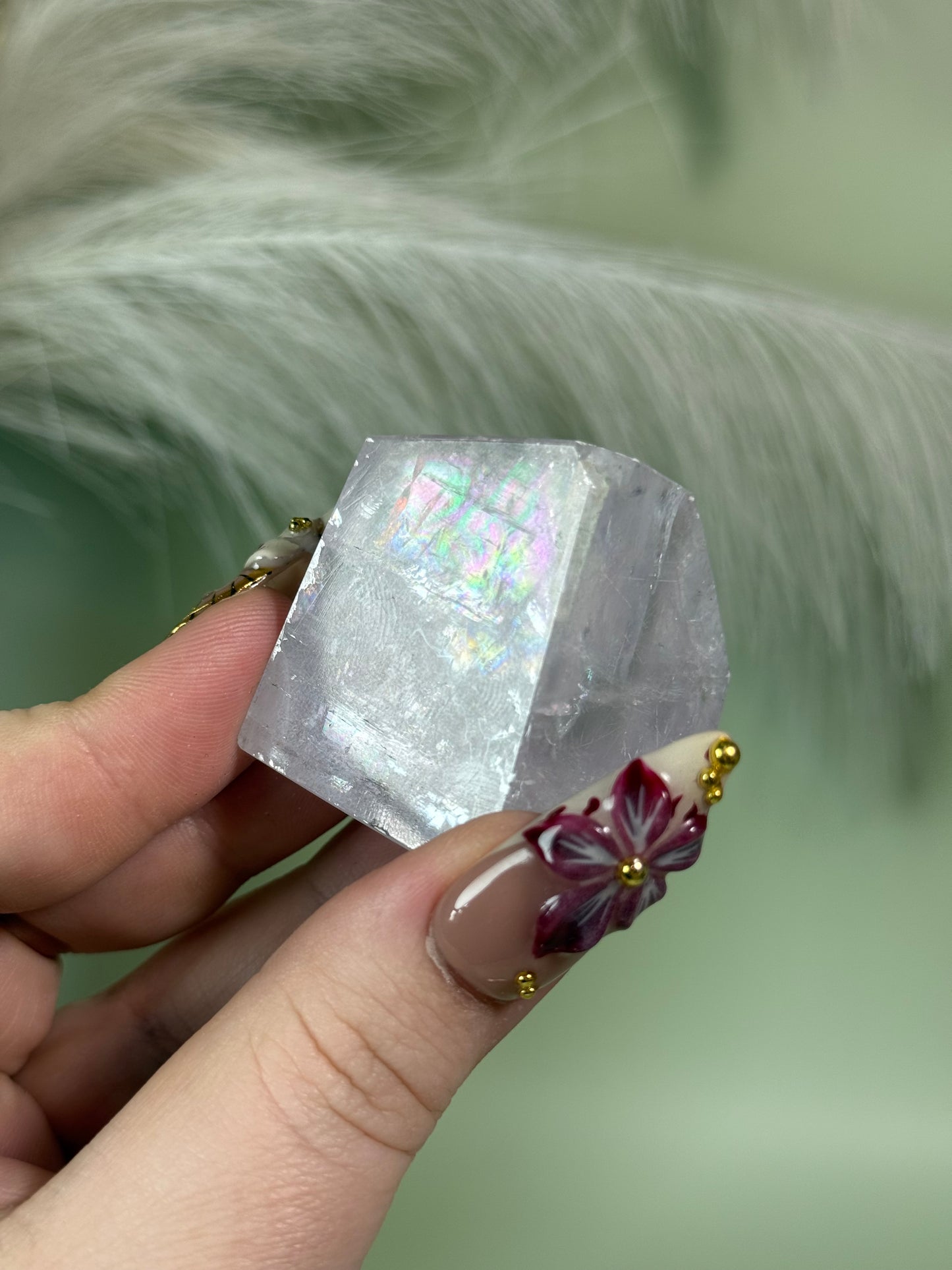 Polished lavender calcite from Madagascar full of rainbows.