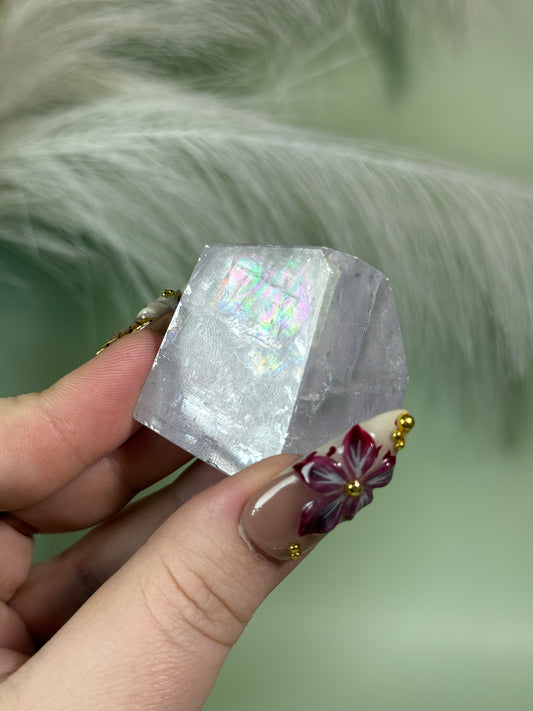 Polished lavender calcite from Madagascar full of rainbows.
