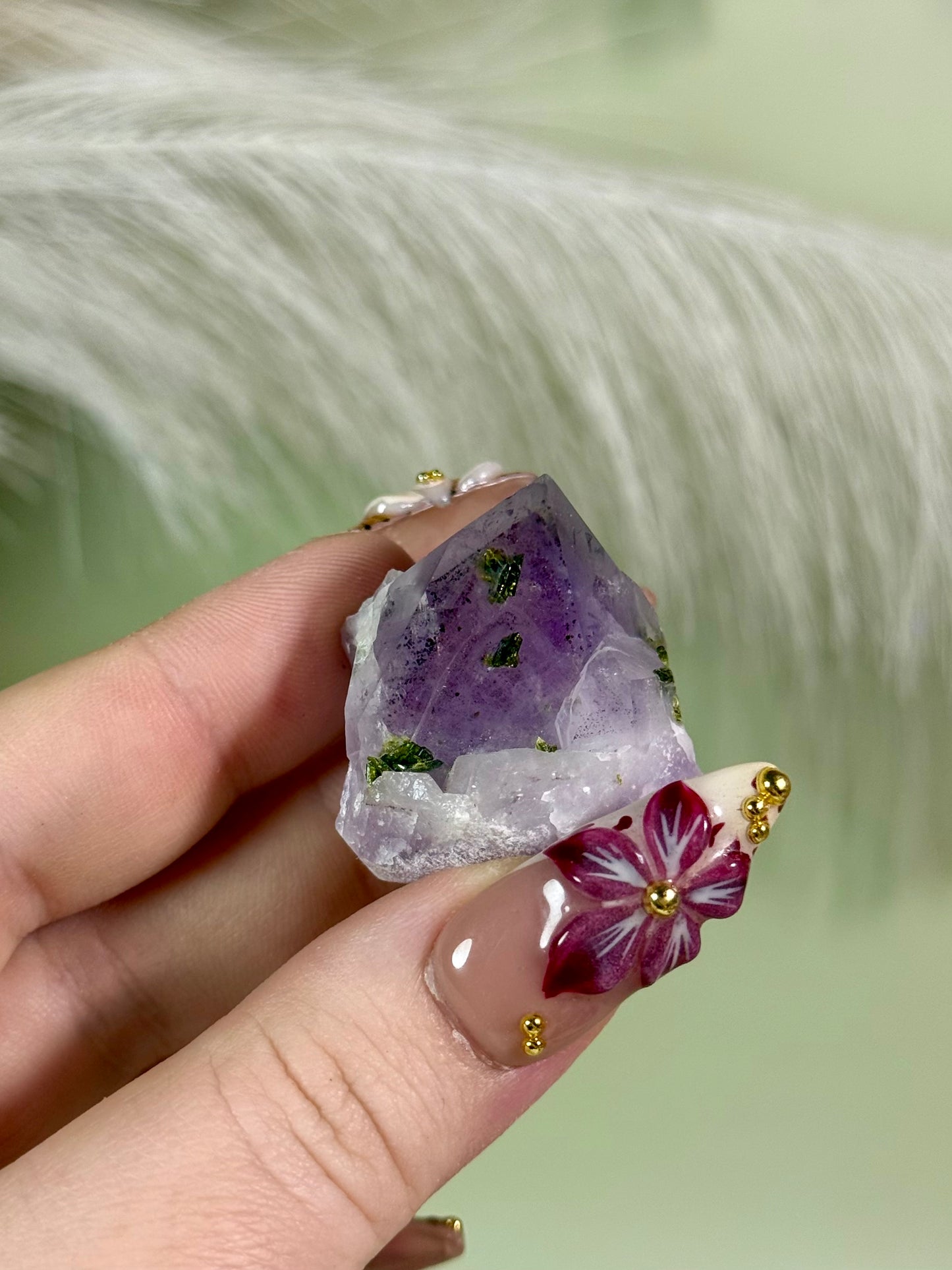 Strawberry super 7 amethyst with epidote.