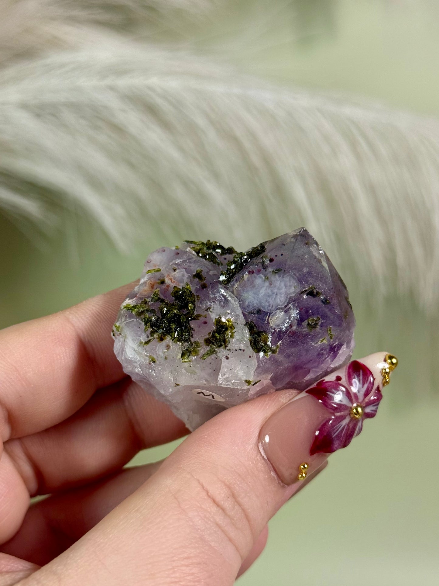 Strawberry super 7 amethyst with epidote.