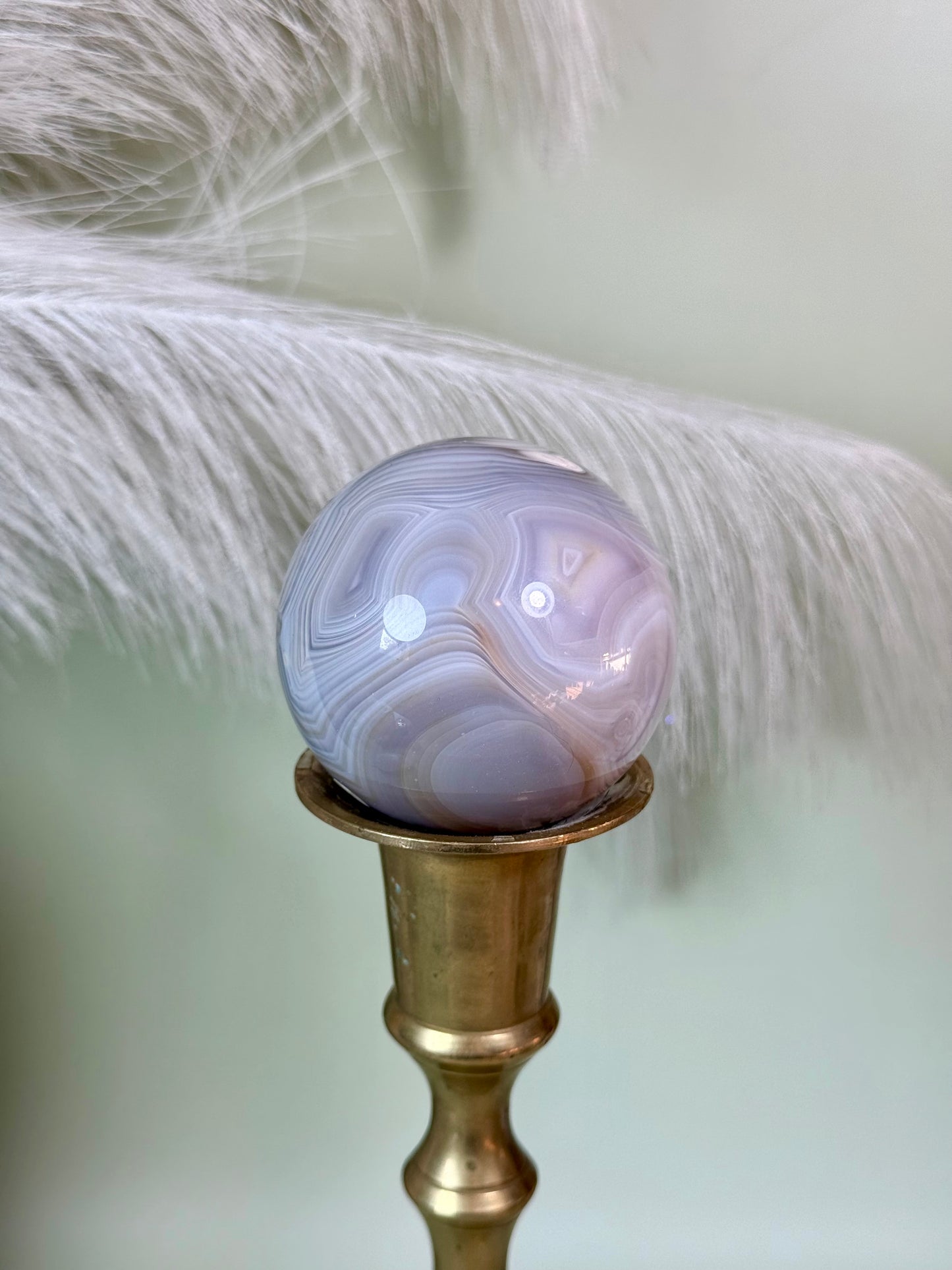 Banded agate sphere.