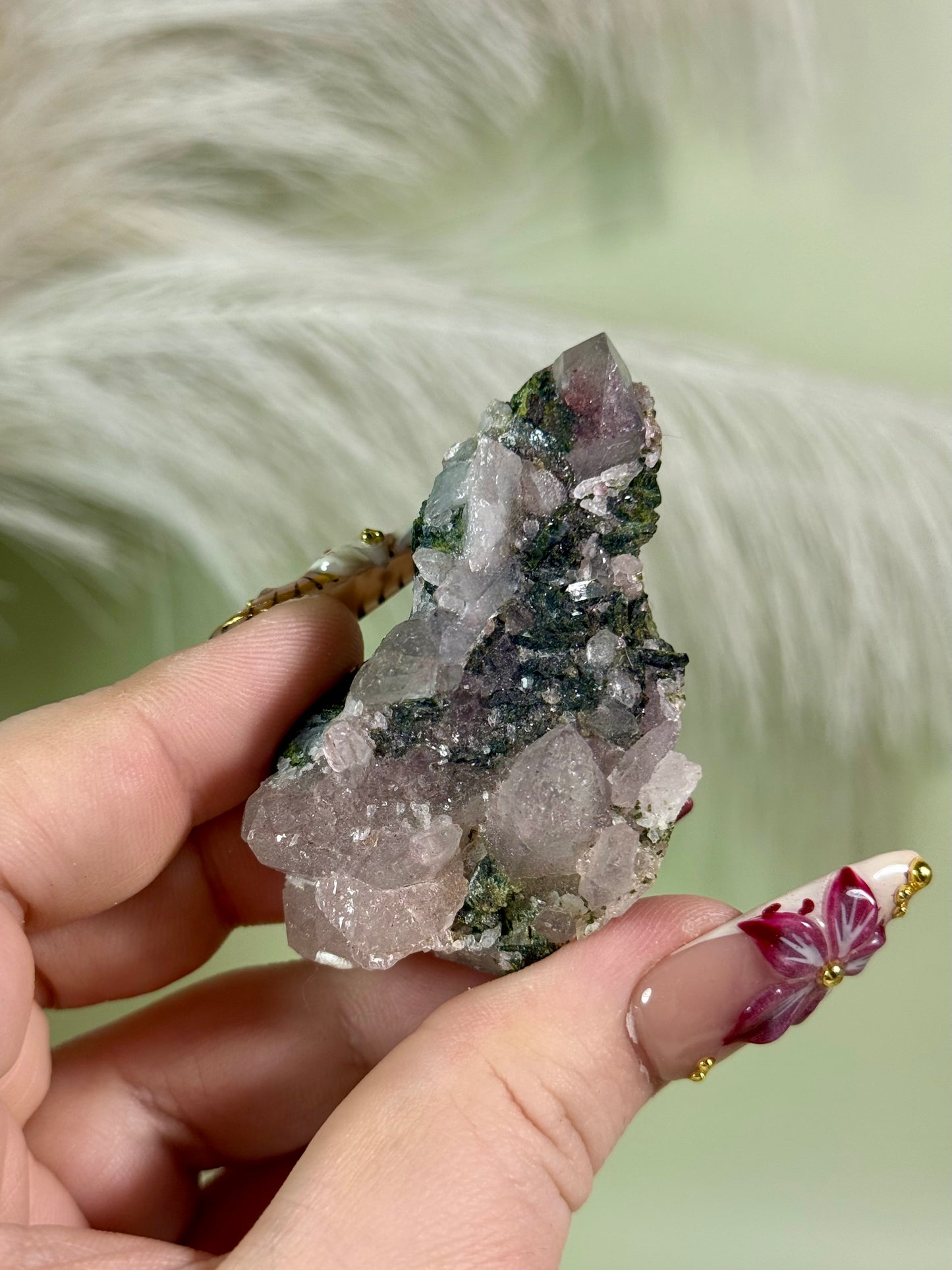 Strawberry super 7 amethyst with epidote.