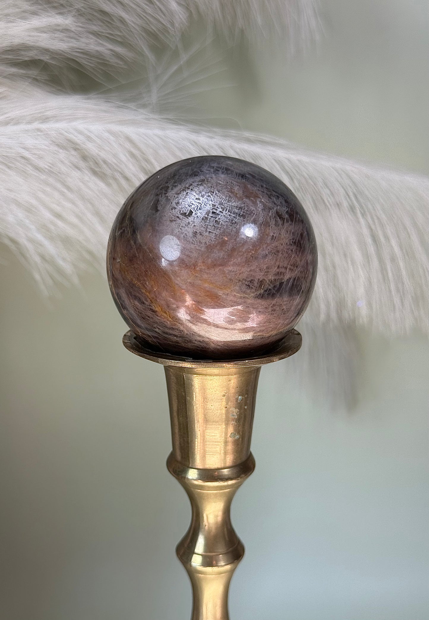 Black moonstone sphere.
