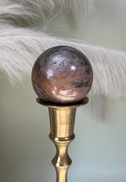 Black moonstone sphere.