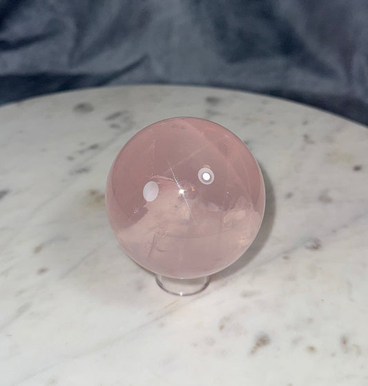 High grade STAR Rose Quartz sphere with rainbows.