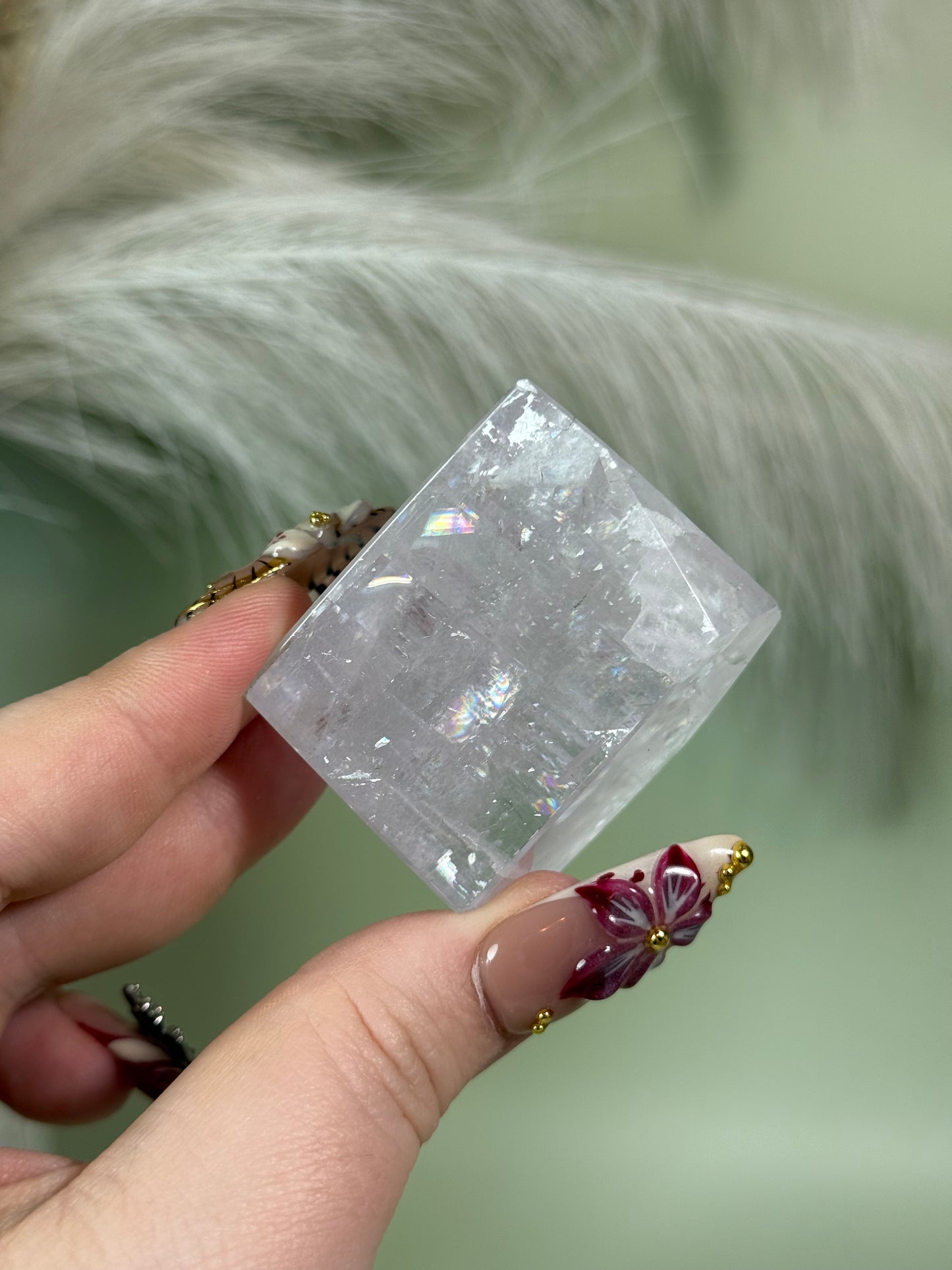 Polished lavender calcite from Madagascar full of rainbows.