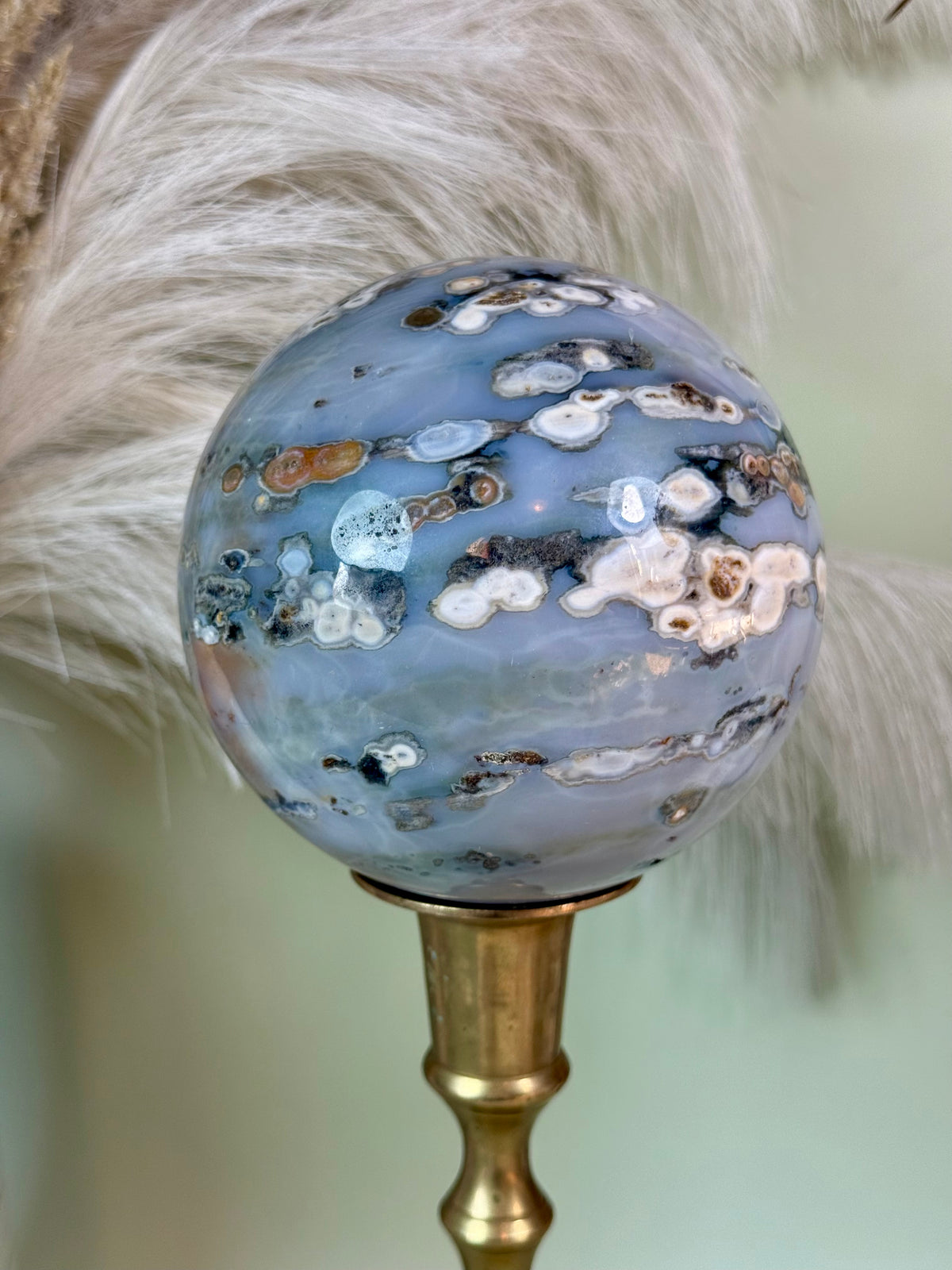 Orbicular Ocean Jasper sphere with blue druzy. (Large.)