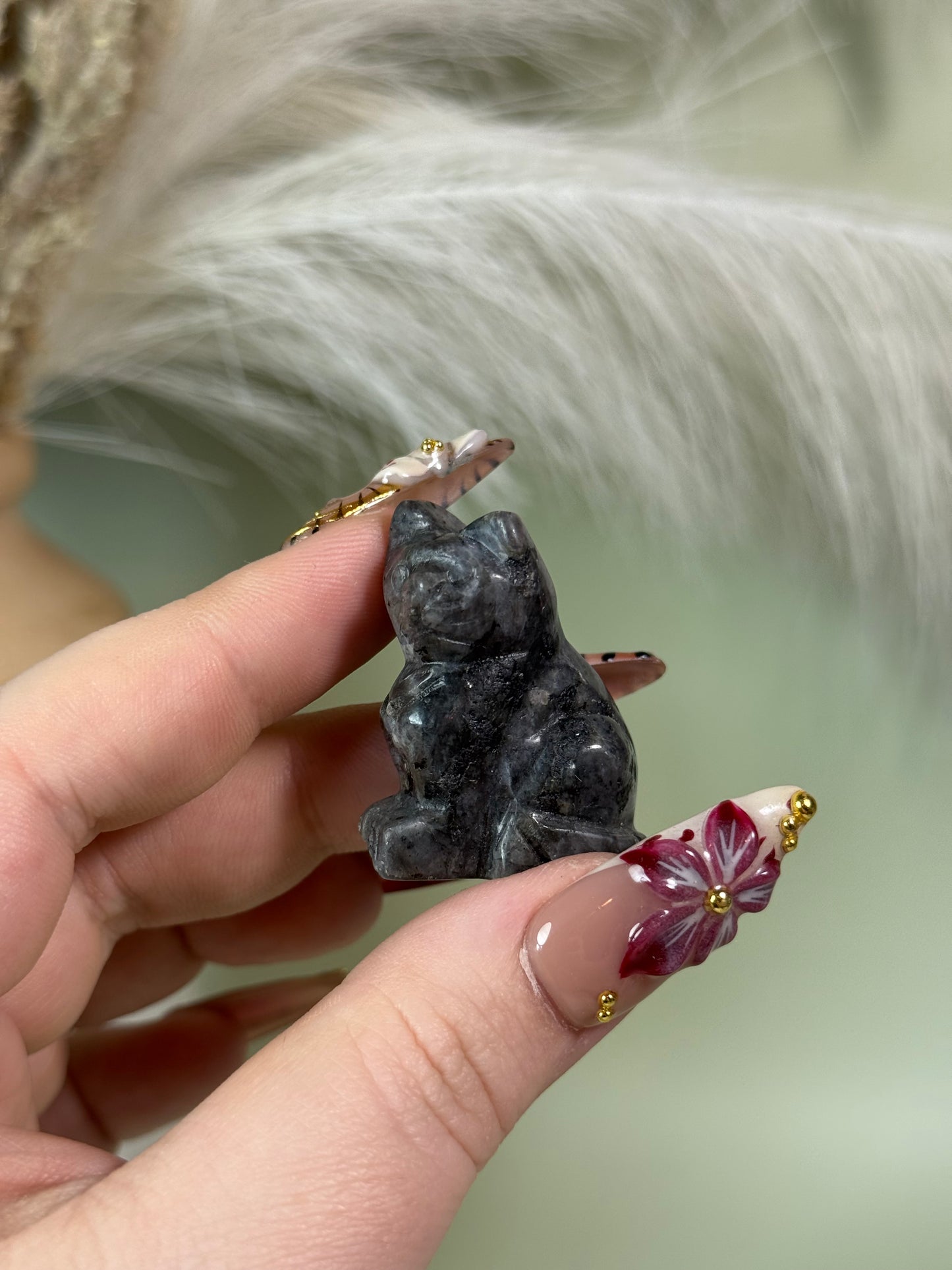 Crystal cat carvings.