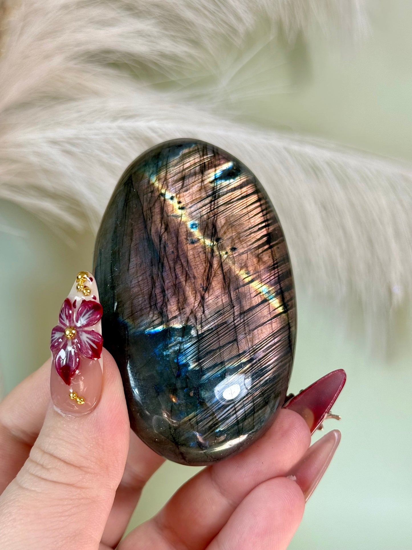 Large labradorite palm stone.