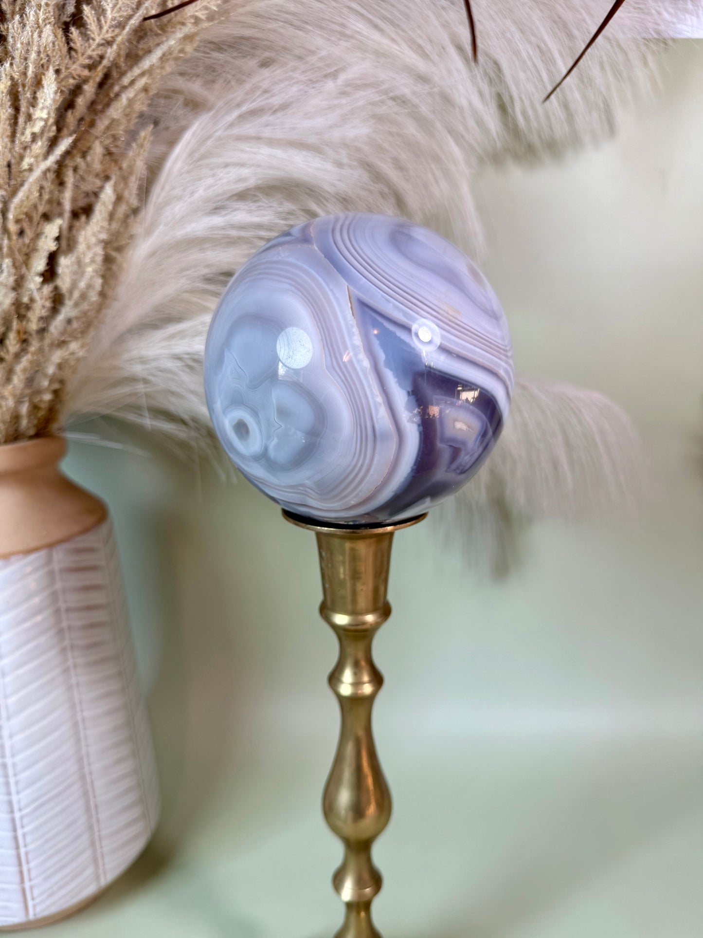 Banded Agate sphere. Repaired.