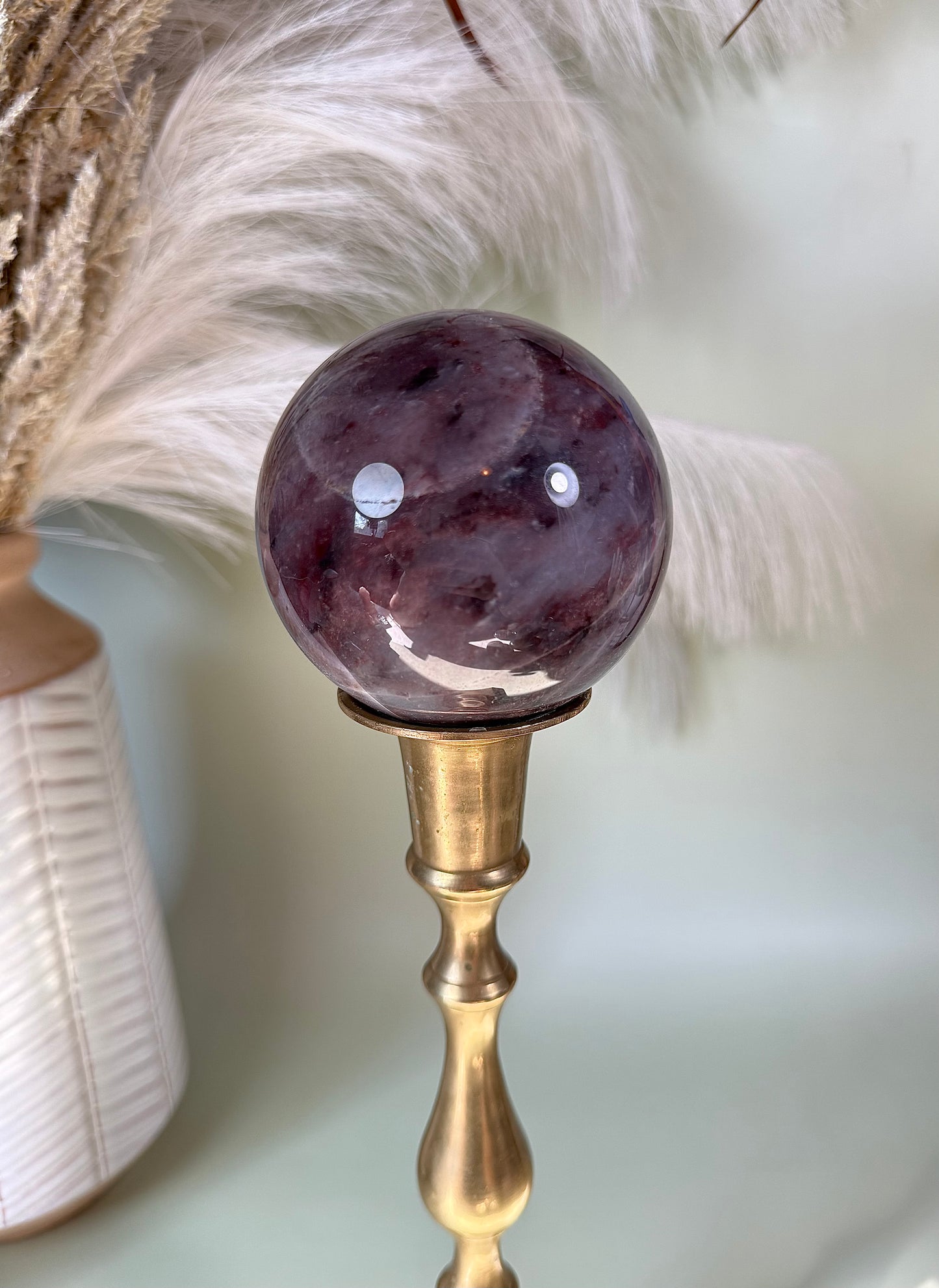 Pink zebra Jasper sphere.