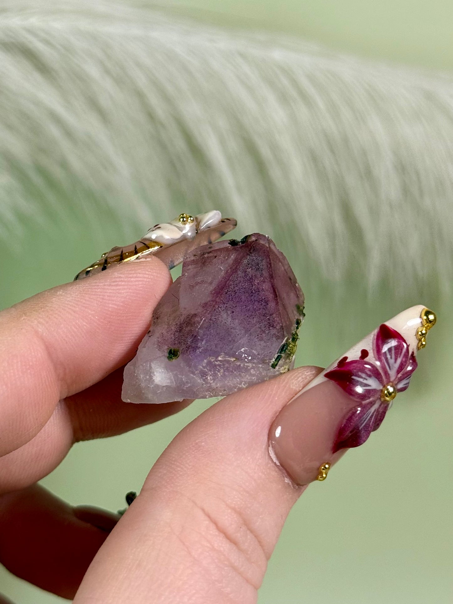 Strawberry super 7 amethyst with epidote.