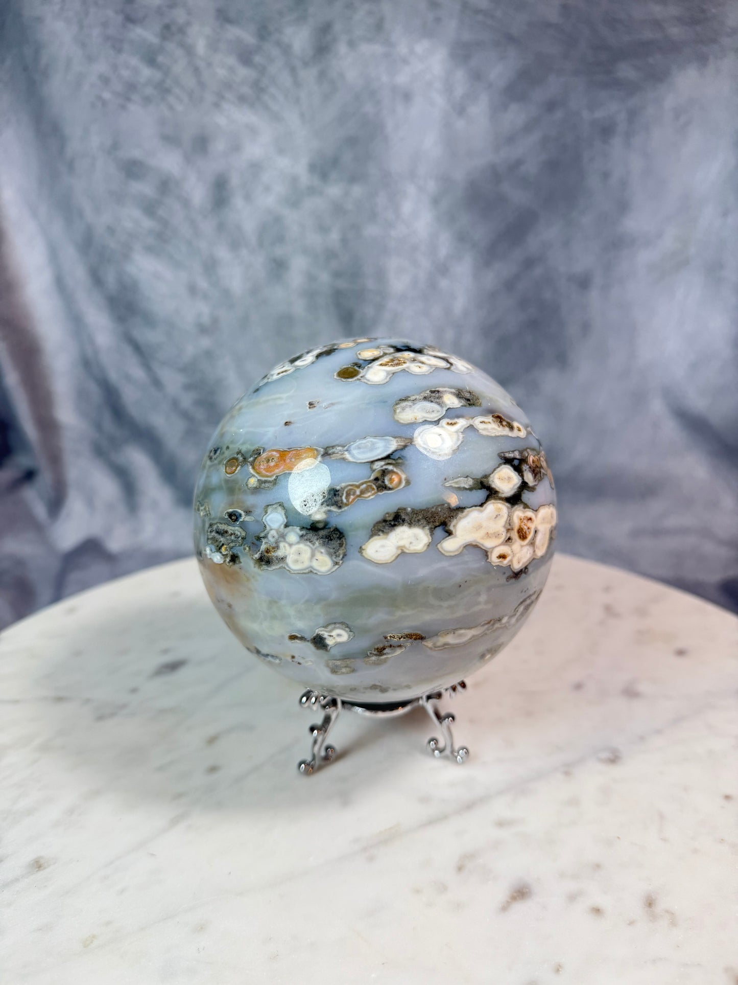 Orbicular Ocean Jasper sphere with blue druzy. (Large.)