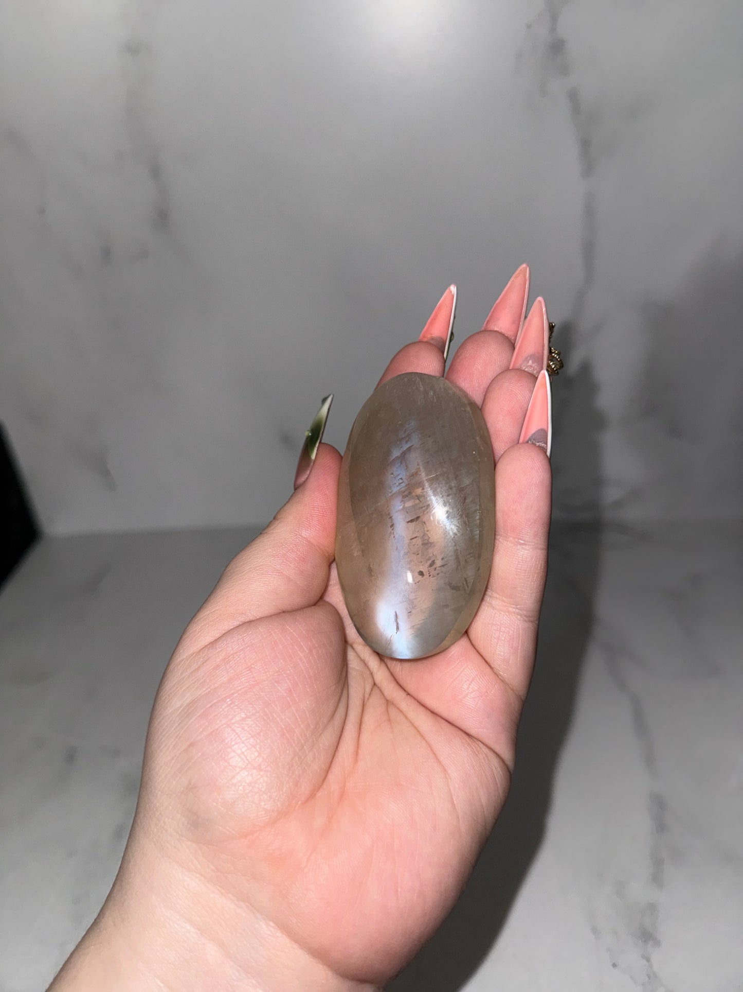 Large Gem Sage moonstone with blue flash palm. (Rare.)