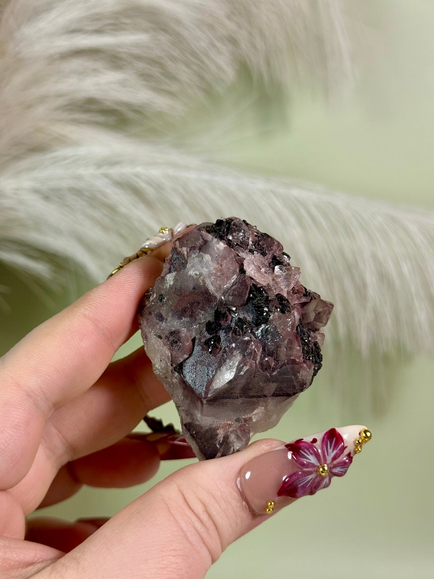 Strawberry super 7 amethyst with epidote.