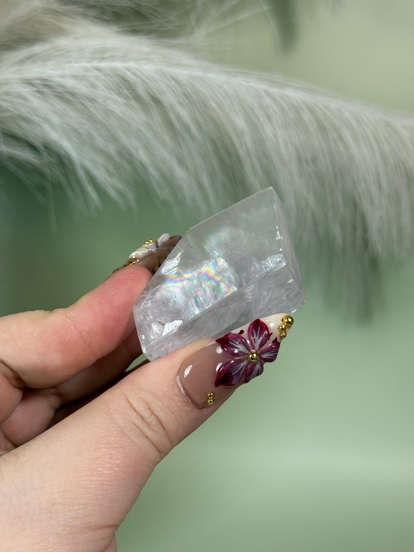 Polished lavender calcite from Madagascar full of rainbows.