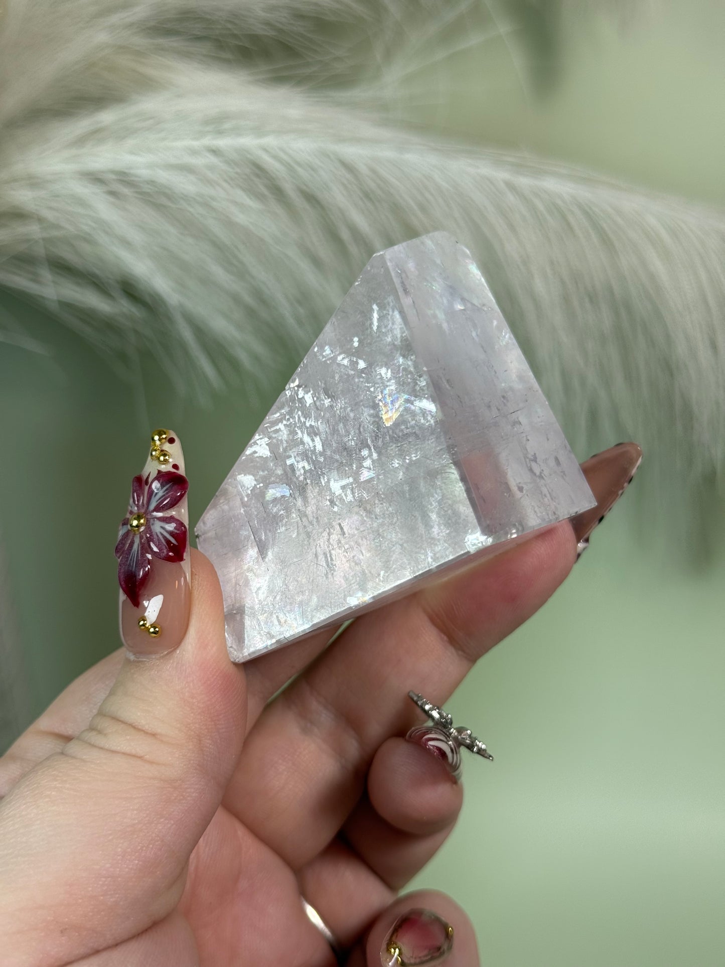 Polished lavender calcite from Madagascar full of rainbows.