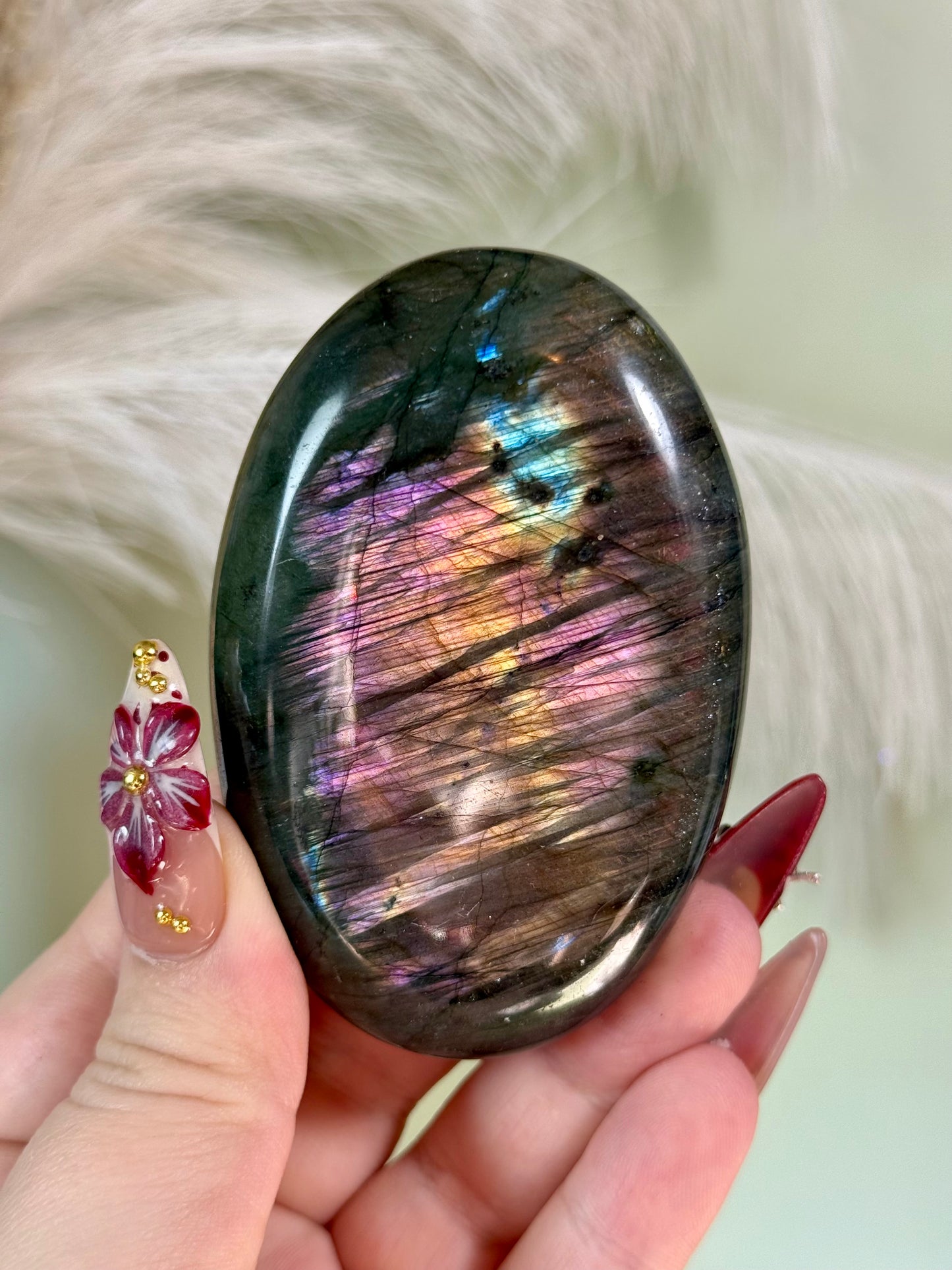 Large labradorite palm stone.