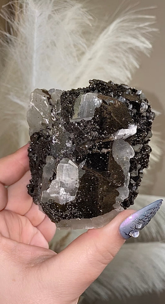 Largest Goethite and pyrite on uv calcite.