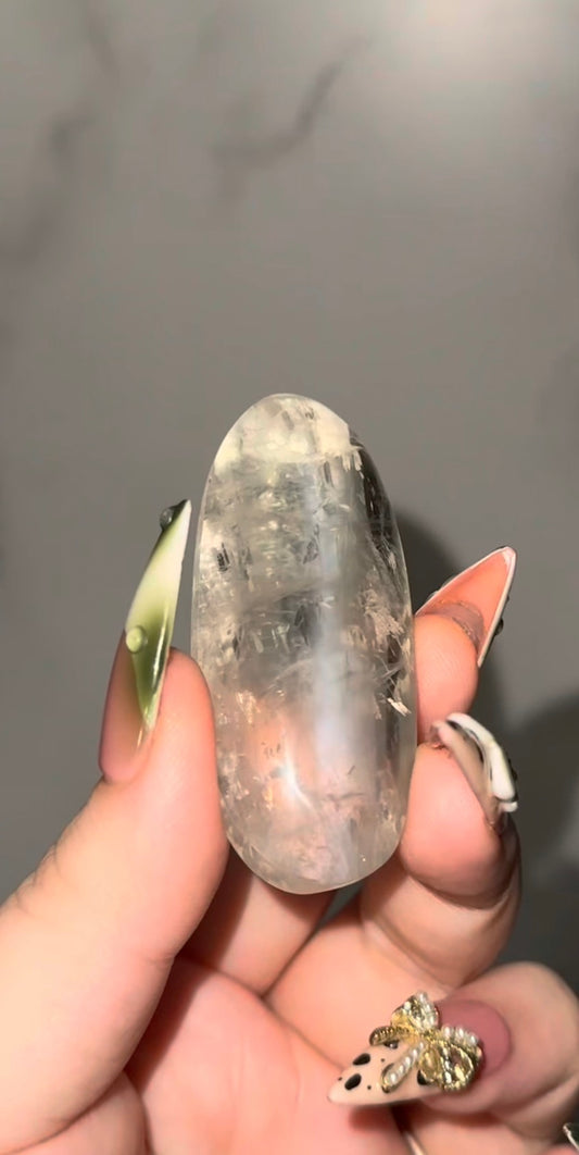 Gem grade Sage moonstone with blue flash palm stone. From Tanzania.