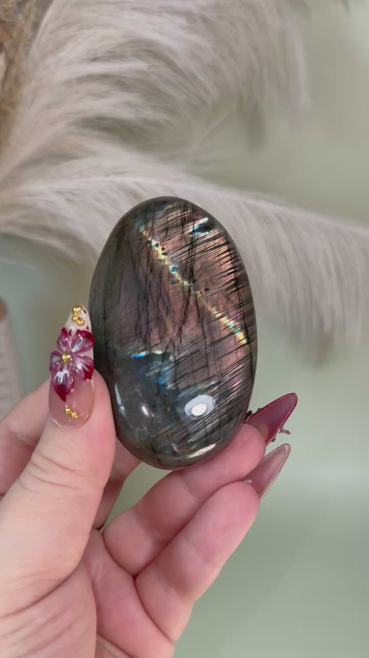 Large labradorite palm stone.