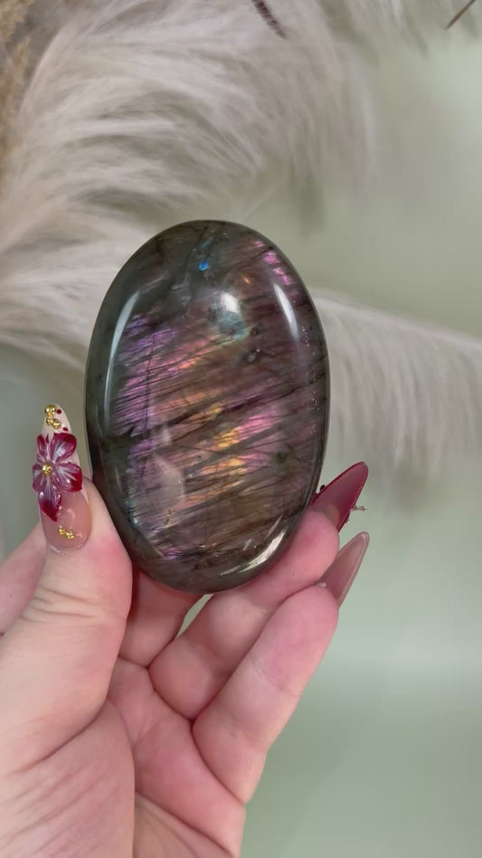 Large labradorite palm stone.