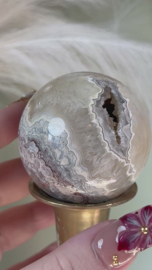 Crazy lace agate sphere.