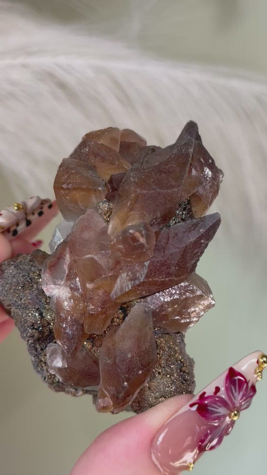 Honey dogtooth calcite with chalcopyrite.