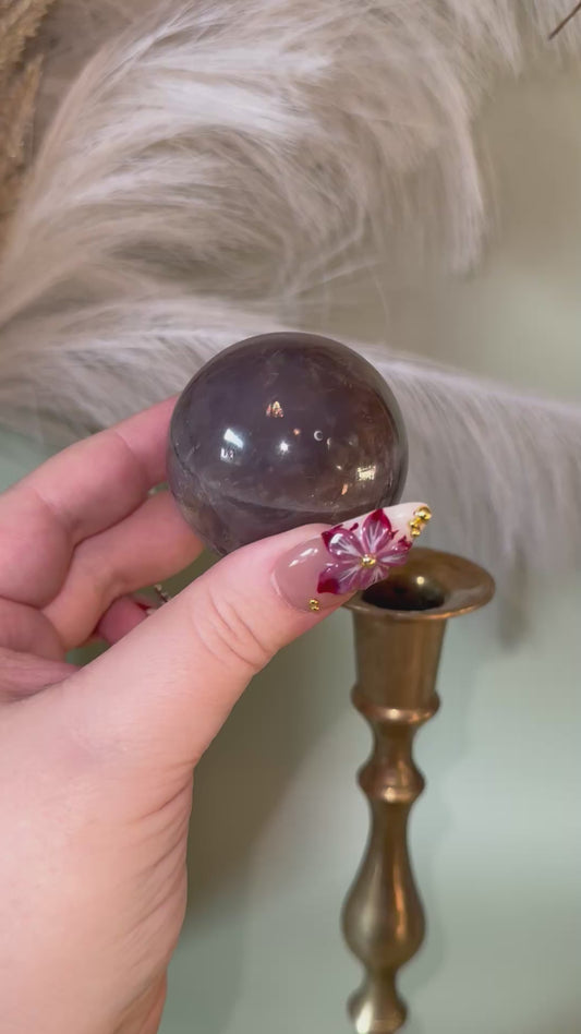 Star blue rose Quartz sphere.
