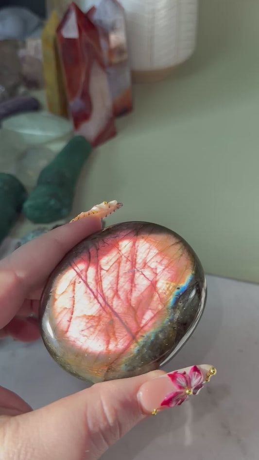 Large labradorite palm stone.