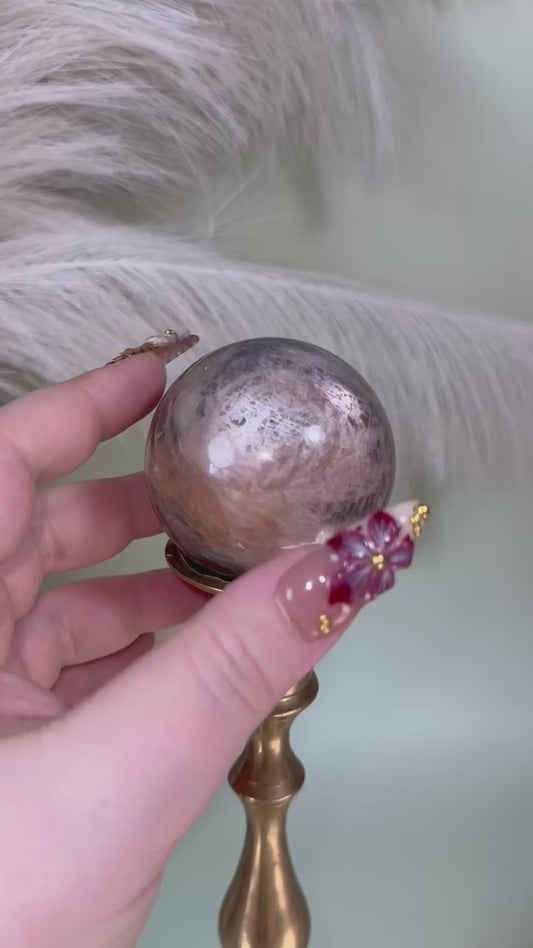Black moonstone sphere.