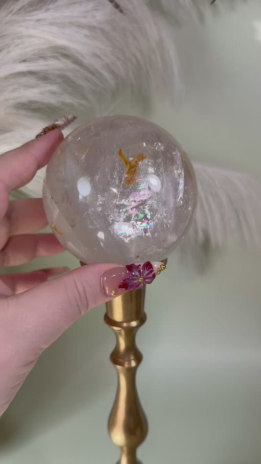 Clear Quartz sphere. “Crystal ball.”