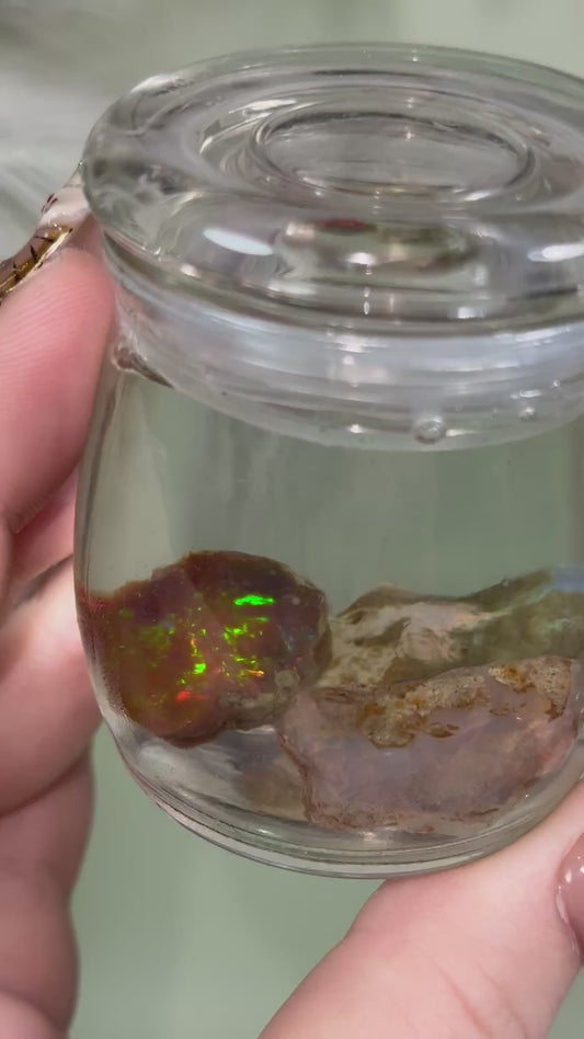 Ethiopian water opal jar. 3 opals.