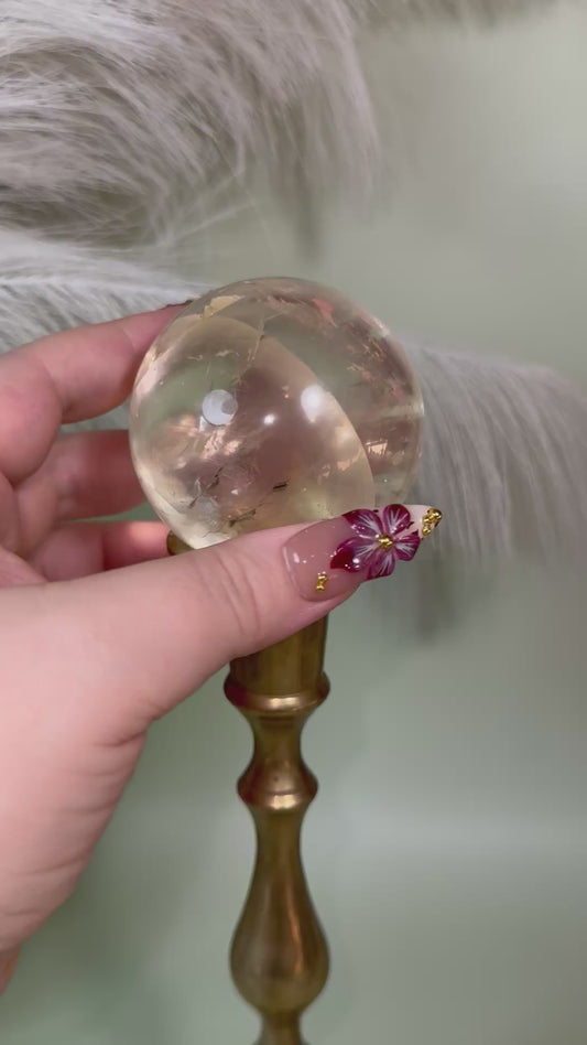 Optical honey calcite sphere.