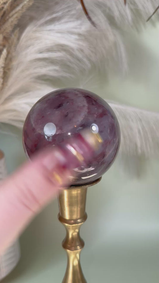 Pink zebra Jasper sphere.
